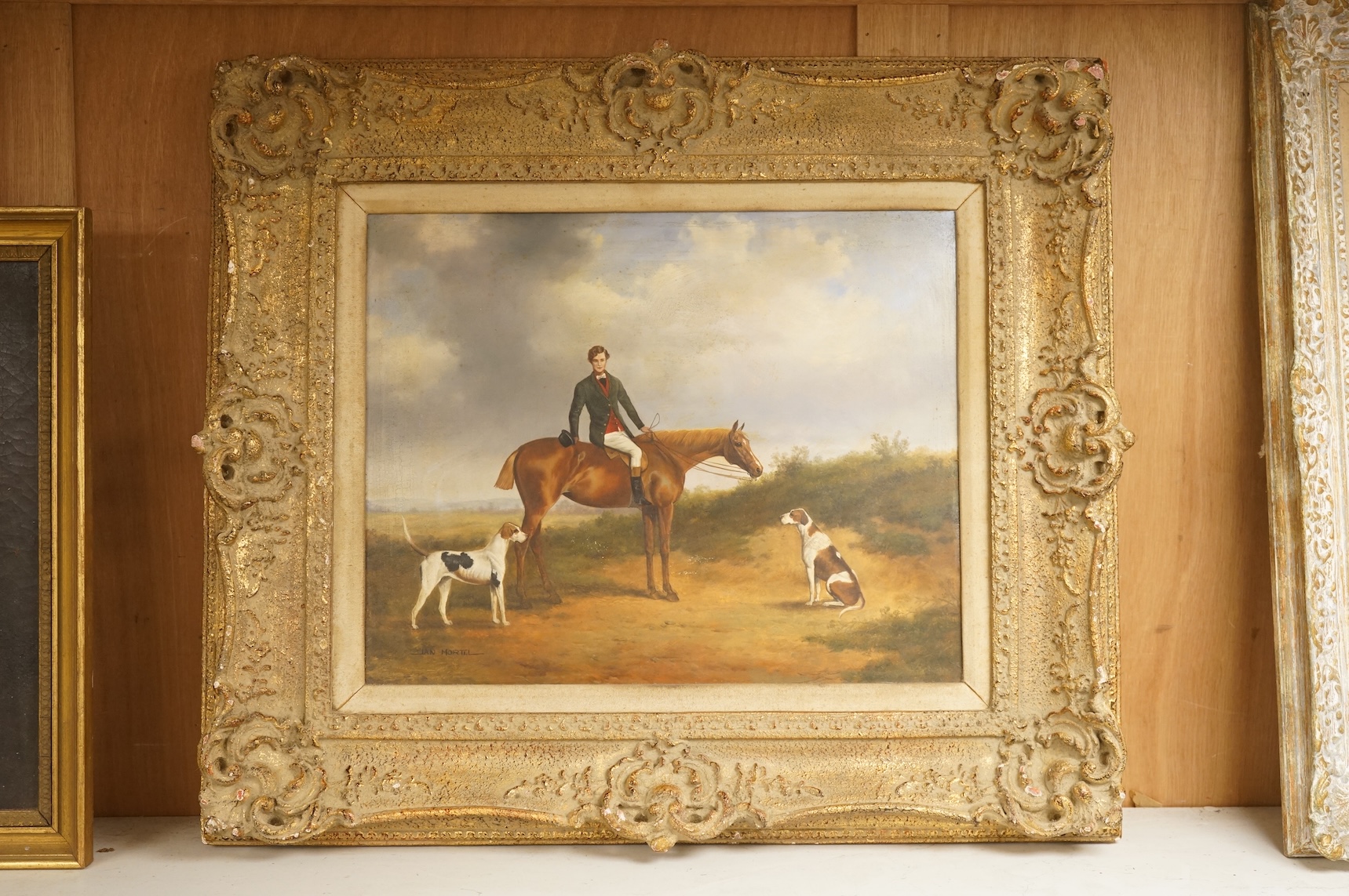 Jan Mortel (20th/21st. C), Study of a huntsman on horseback with hounds, signed, oil on board, 39 x 49cm, ornate frame